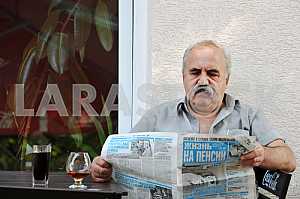 Man reading newspaper