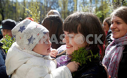 A girl in her mother's arms
