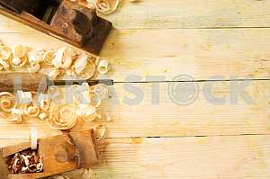 Carpenter tools on wooden table with sawdust. Circular Saw.