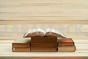 Stack of hardback books isolated on white background. Back to school. Copy space