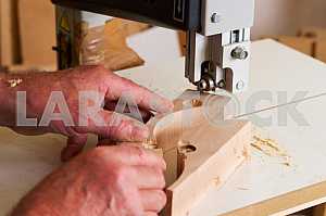Carpenter tools on wooden table with sawdust. Circular Saw. Carpenter workplace top view