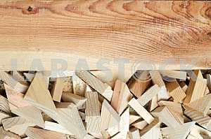 Different construction tools on a wooden background - screwdriver, caliper.