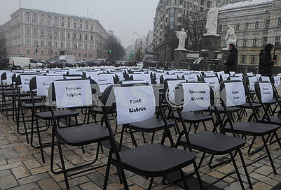 Empty chairs with the names of prisoners in Russia and the Crimea and prisoners in ORDLO