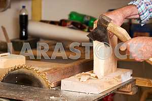Carpenter tools on wooden table with sawdust. Circular Saw. Carpenter workplace top view