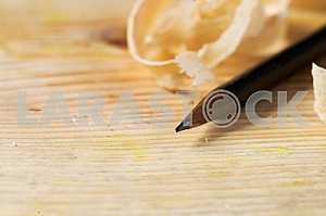 Carpenter tools on wooden table with sawdust. Circular Saw.