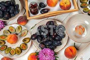 Blank white dish on a wood background.