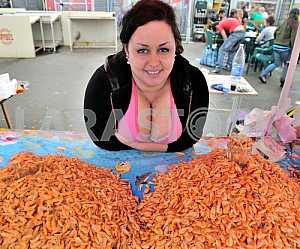 Woman sells shrimp on the market "Privoz" September 9, 2011