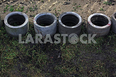 Four concrete drainage pipes
