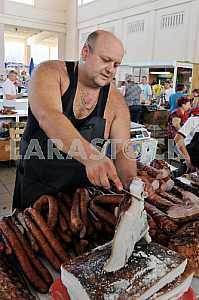 A man sells fish in the market "Privoz" July 5, 2012