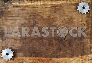 Different construction tools on a wooden background - screwdriver, caliper.