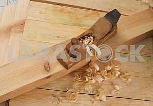 Carpenter tools on wooden table with sawdust. Circular Saw.