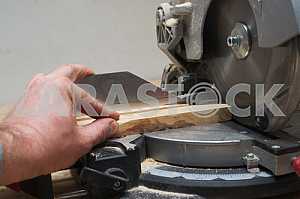 Carpenter tools on wooden table with sawdust. Circular Saw.