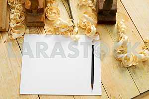 Carpenter tools on wooden table with sawdust. Circular Saw.