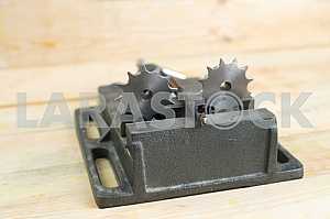 Different construction tools on a wooden background - screwdriver, caliper.