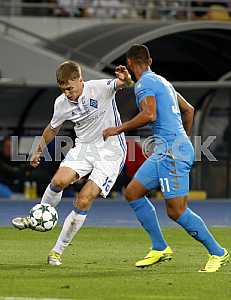  Sergey Sydorchuk of Dynamo (Kiev) (left) fights for the ball with Faouzi Ghoulam from Napoli (Naples) (right)