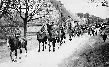 German procession. In the foreground of the cavalry