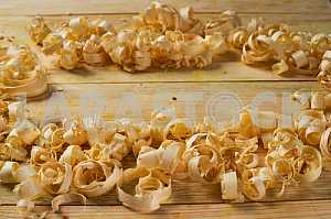 Carpenter tools on wooden table with sawdust. Circular Saw.
