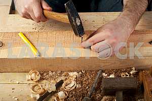 Carpenter tools on wooden table with sawdust. Circular Saw.