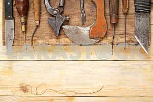 Carpenter tools on wooden table with sawdust. Circular Saw.