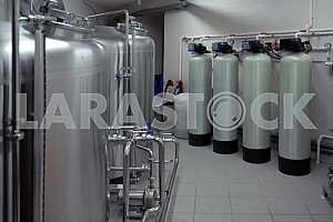 Row of tanks in microbrewery