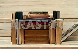Stack of hardback books isolated on white background. Back to school. Copy space