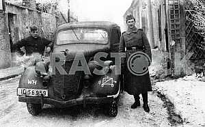 German soldiers at the car Ford