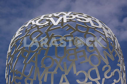 Composition with white letters on a blue sky