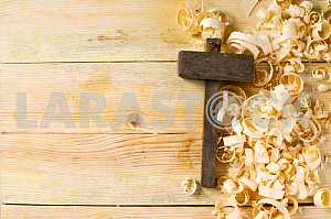 Carpenter tools on wooden table with sawdust. Circular Saw.