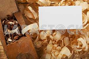 Carpenter tools on wooden table with sawdust. Circular Saw.