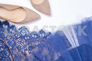 Woman clothes and accessories. Soft blue colors female apparel.