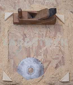 Different construction tools on a wooden background - screwdriver, caliper.