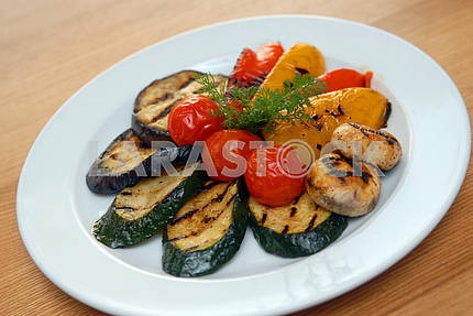 Fried vegetables on a grill