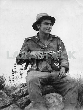 A soldier with a gun Kalashnikov