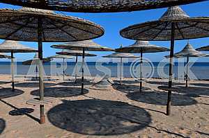 Thatched umbrellas on the beach