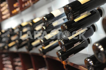 Wine bottles in shop of spirits