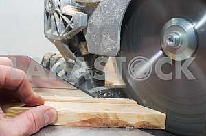 Carpenter tools on wooden table with sawdust. Circular Saw.
