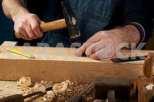 Carpenter tools on wooden table with sawdust. Circular Saw.