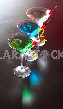 Classical martini with berries of a cherry