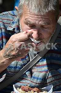 Man eats porridge