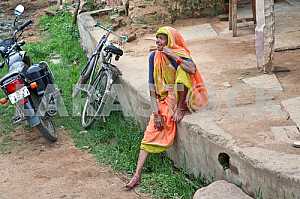 Indian grandmother with tattoos on his hands.