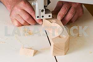 Carpenter tools on wooden table with sawdust. Circular Saw. Carpenter workplace top view
