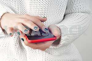 Beautiful young  hipster woman using smart phone