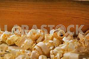 Carpenter tools on wooden table with sawdust. Circular Saw.
