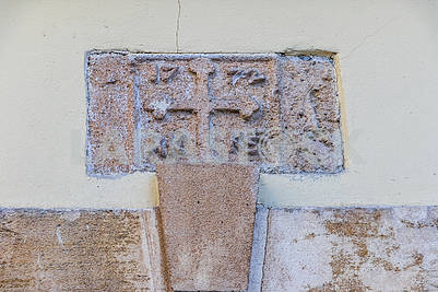 Bas-relief on the wall of an old house