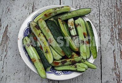 Sliced healthy natural cucumbers with spices