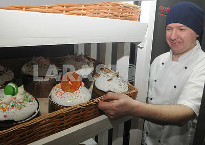 Cook shows an assortment of Easter cakes