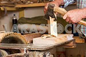 Carpenter tools on wooden table with sawdust. Circular Saw. Carpenter workplace top view