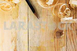 Carpenter tools on wooden table with sawdust. Circular Saw.