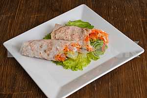 Vegetables with sour cream, wrapped in bread of pita
