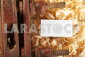 Carpenter tools on wooden table with sawdust. Circular Saw.